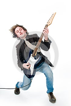 Young man playing electro guitar