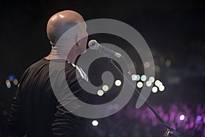 Young man playing electronic keyboard.