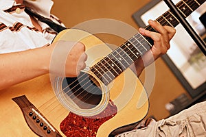 Young man playing guitar