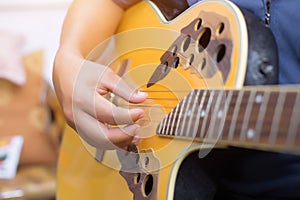 Young man playing guitar