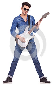 Young man playing guitar