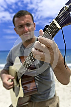 Young man playing the guitar