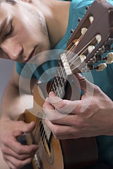 Young Man Playing Guitar