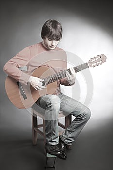 Young man playing guitar