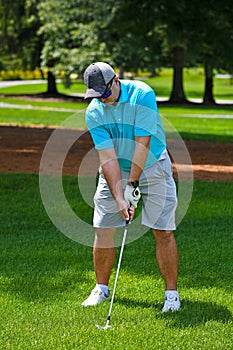 Young Man Playing a Round of Golf