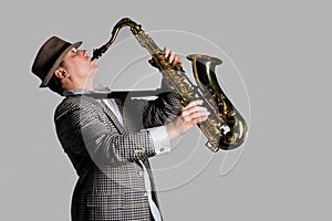 Young man playing the saxophone