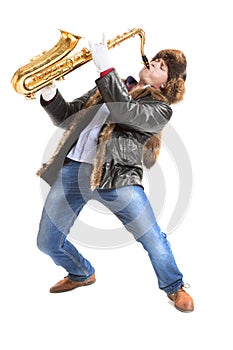 Young man playing on saxophone