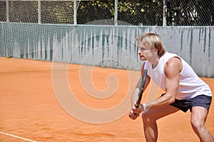 Young man playing tennis