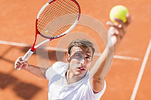 Young man playing tennis