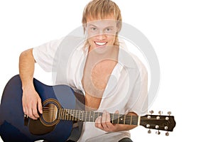 Young man plays guitar