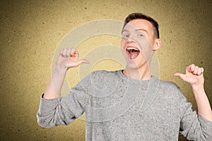 Young man pointing itself