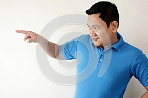 Young Man Pointing To The Side