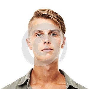 Young man, portrait and face with hairstyle, serious or blank stare isolated against a white studio background
