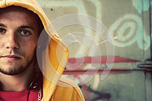 Young man portrait, graffiti