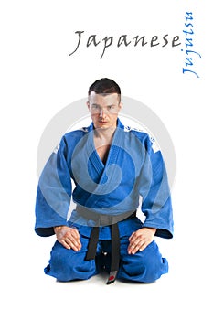 Young man practicing jiu-jitsu (Hakki Heysen Ryu school) photo