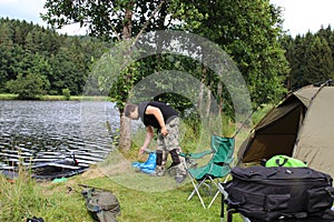 Young man practicing survival training