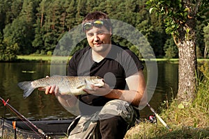 Young man practicing survival training