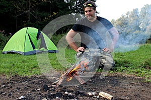 Young man practicing survival training