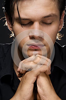 Young man praying
