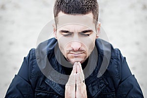 Young man praying