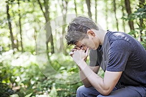 Young man praying