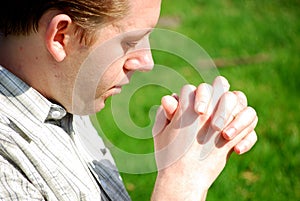 Young man praying