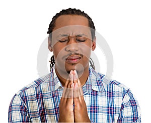 Mladý muž modlí ruky zatváracie dúfať že 