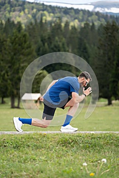 Young Man Preparing For A Sprint