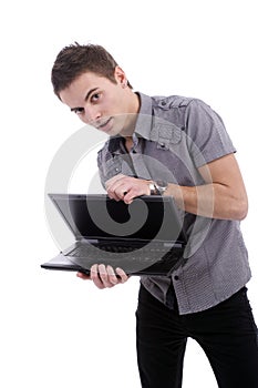 Young man, presenting laptop