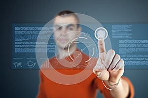 Young man pressing digital button
