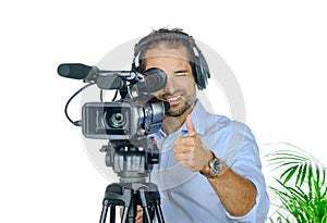 Young man with professional movie camera