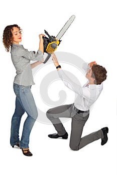 Young man is protected from girl with chain saw