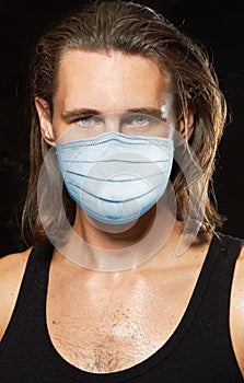 Young man in a protection mask