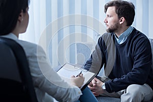 Young man during psychological therapy