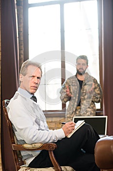 Young man at psychologist`s office