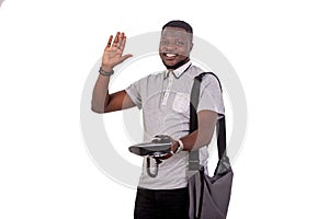 Young man raising hand while giving mobile phone smiling