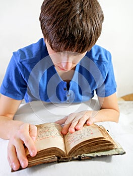 Young Man read the Old Book