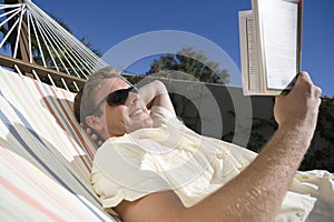 Young Man Reading Book