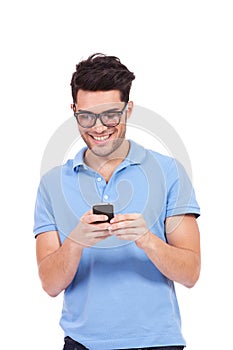 Young man reading an sms