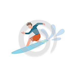 Young man in red shorts surfing on the ocean wave