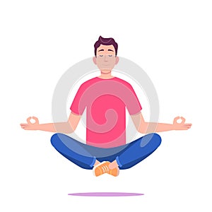 Young man in red T-shirt and sneakersmeditating in lotus position.