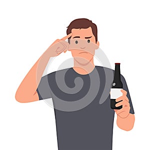 Young man refuse drinking alcohol. Decisive male make hand gesture sign say stop no to alcoholic cocktail. Pointing his forehead