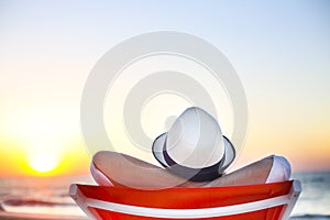 Young man relaxing on the beach