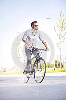 Young man riding a bicycle