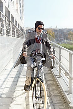 Young man riding a bicycle