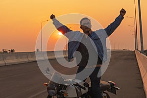 Young man riding big bike motocycle on asphalt high way against, Motorbike man has freedom