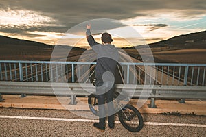 Young man riding a bmx bike. BMX rider. Urban sports