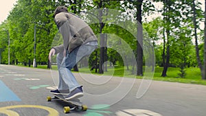 Young man riding on longboard