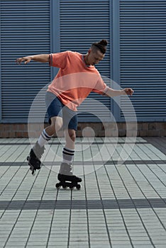 Young man in roller blades and