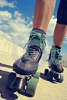 Young man roller skating